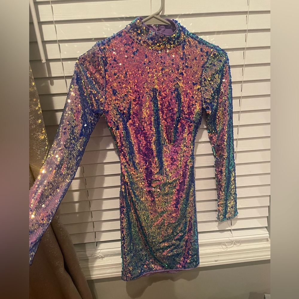 Beautiful colorful mini long, open back sleeve dress. Never worn